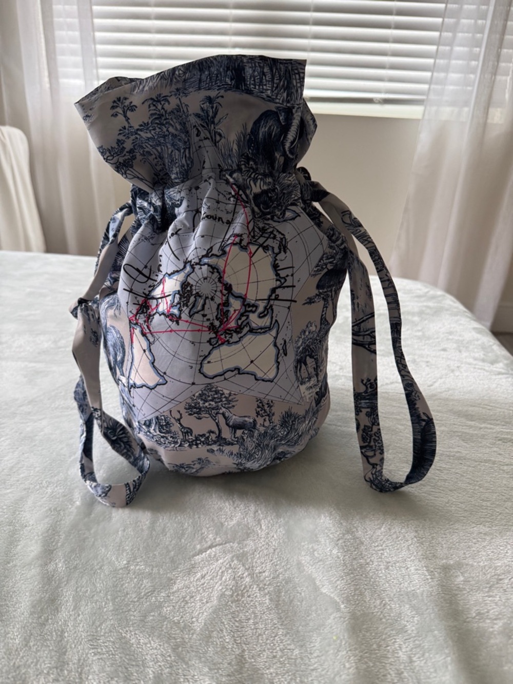 Dior Drawstring Bucket Bag in White and Navy with Pink Accents
